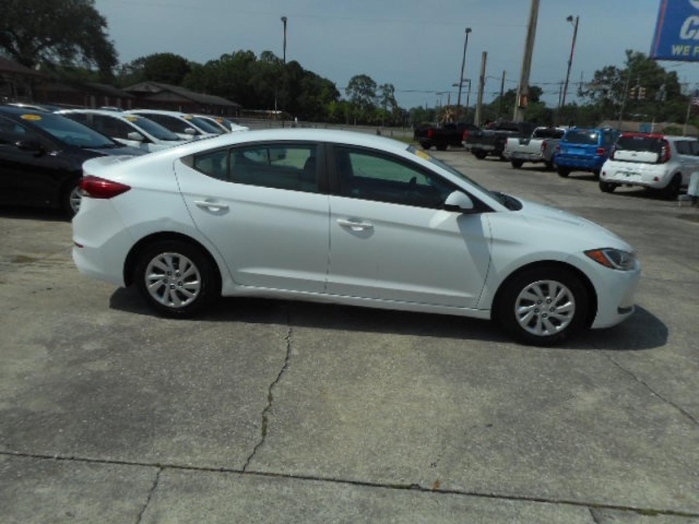 2017 WHITE HYUNDAI ELANTRA LIMITED; SE (5NPD74LFXHH) , located at 1200 Cassat Avenue, Jacksonville, FL, 32205, (904) 695-1885, 30.302404, -81.731033 - Photo#4